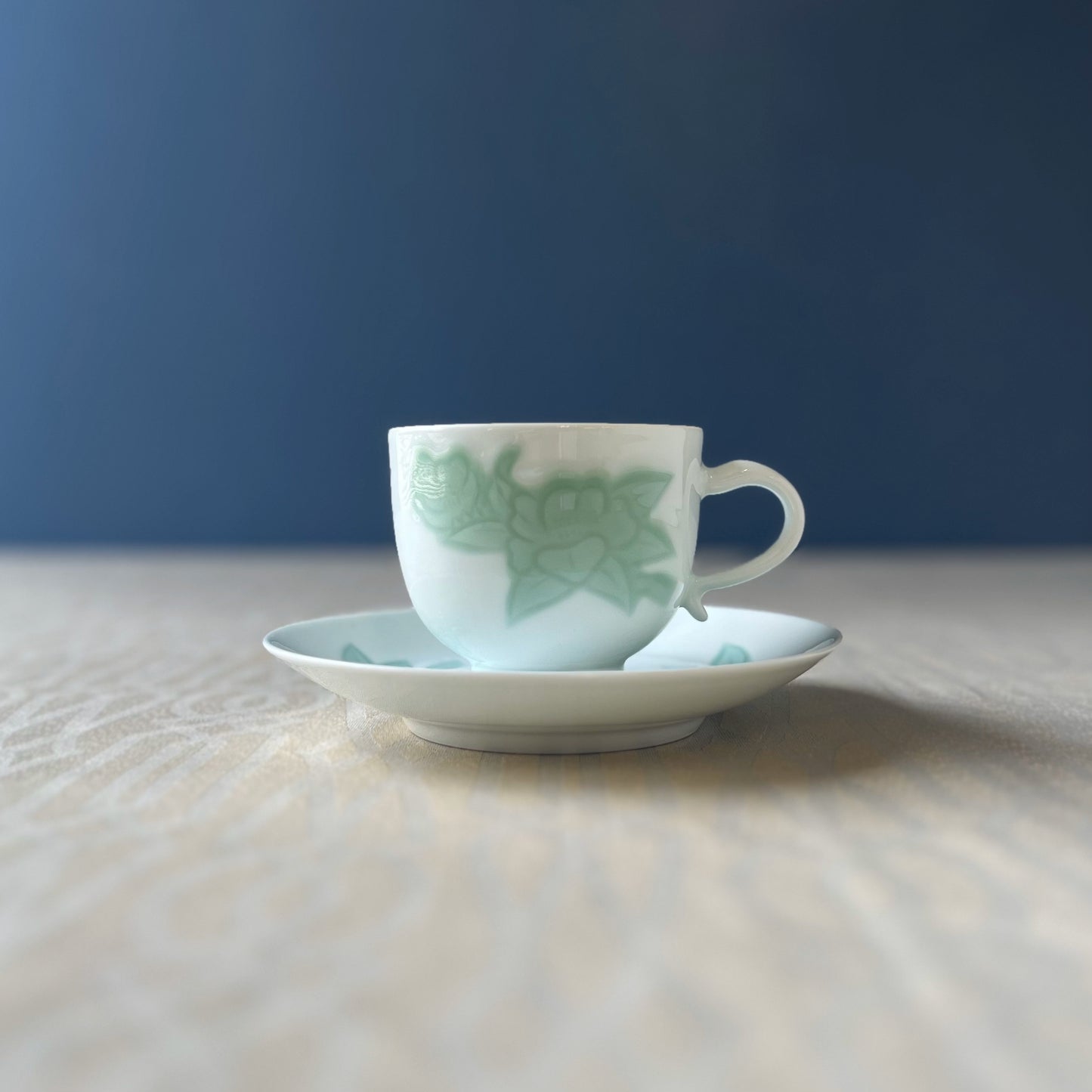 Arita ware | Living National Treasure | Manji Inoue | White porcelain green glaze camellia carving , coffee bowl